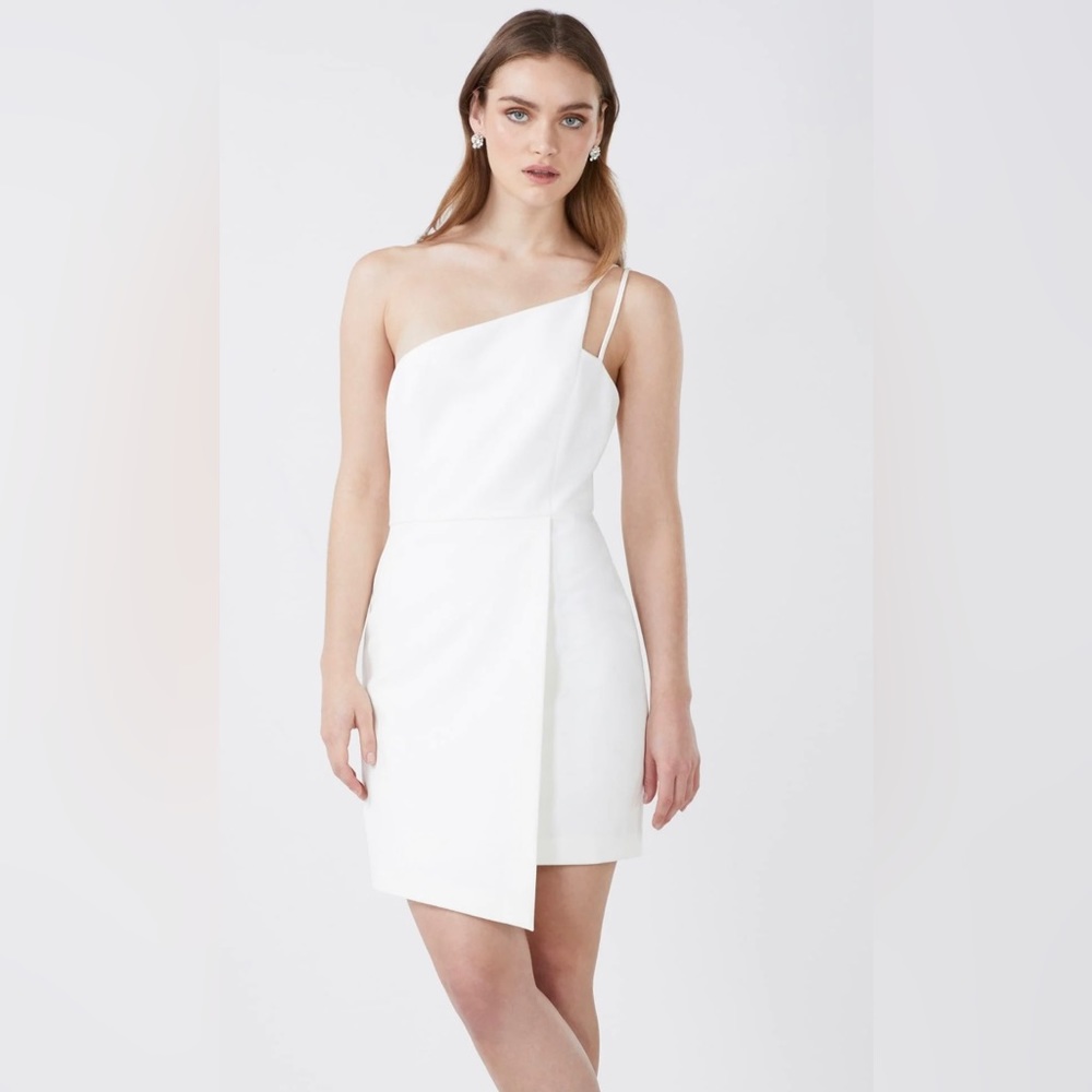 Never worn with tags BCBG off white one shoulder mini dress size 6.